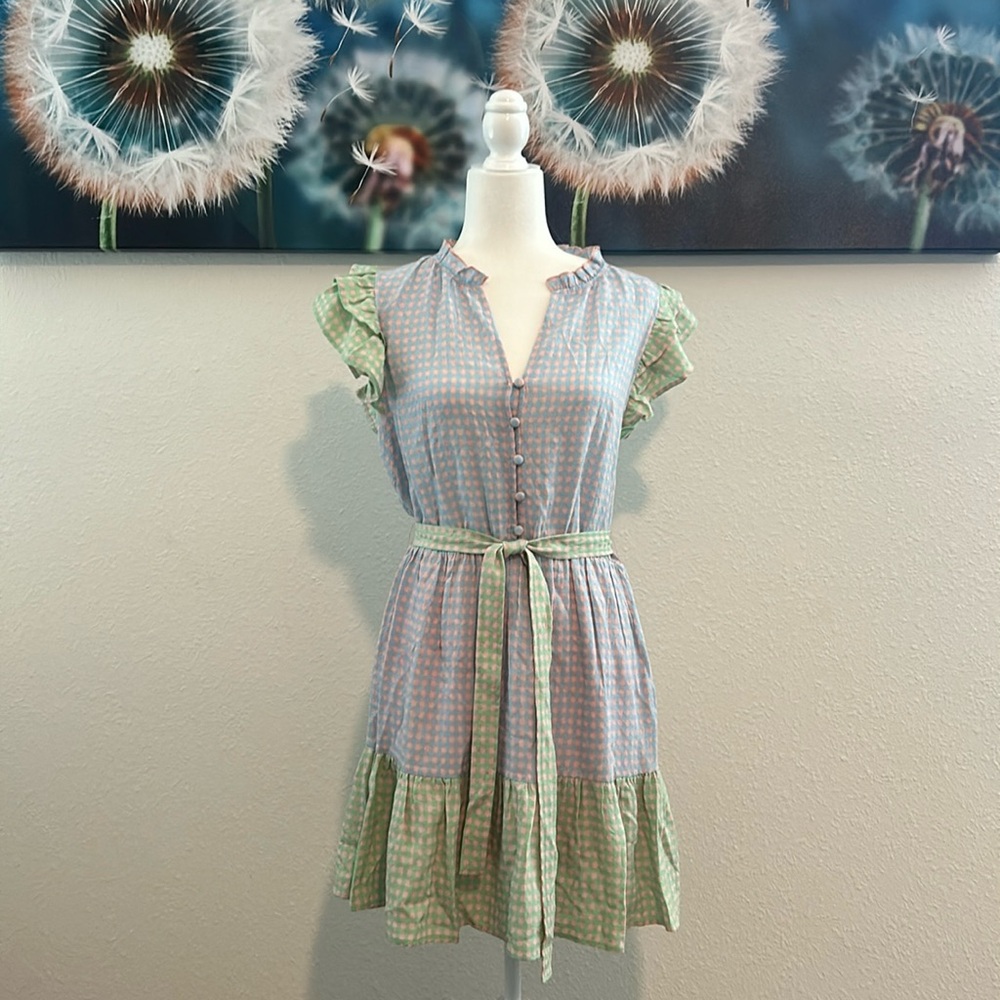 Greylin pink-and-blue gingham bodice, playful green accents, and ruffled sleeves